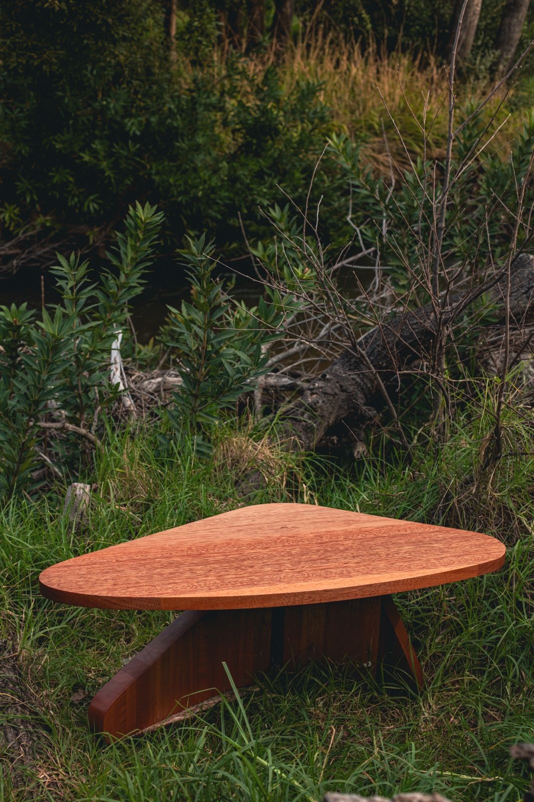Risibiki Table photographed in the grass
